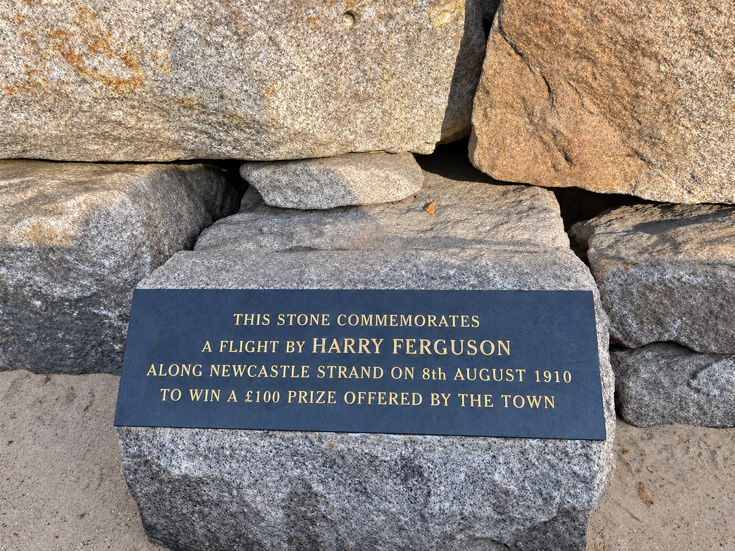 Commemoration stone marking Harry Ferguson’s flight at Newcastle Strand